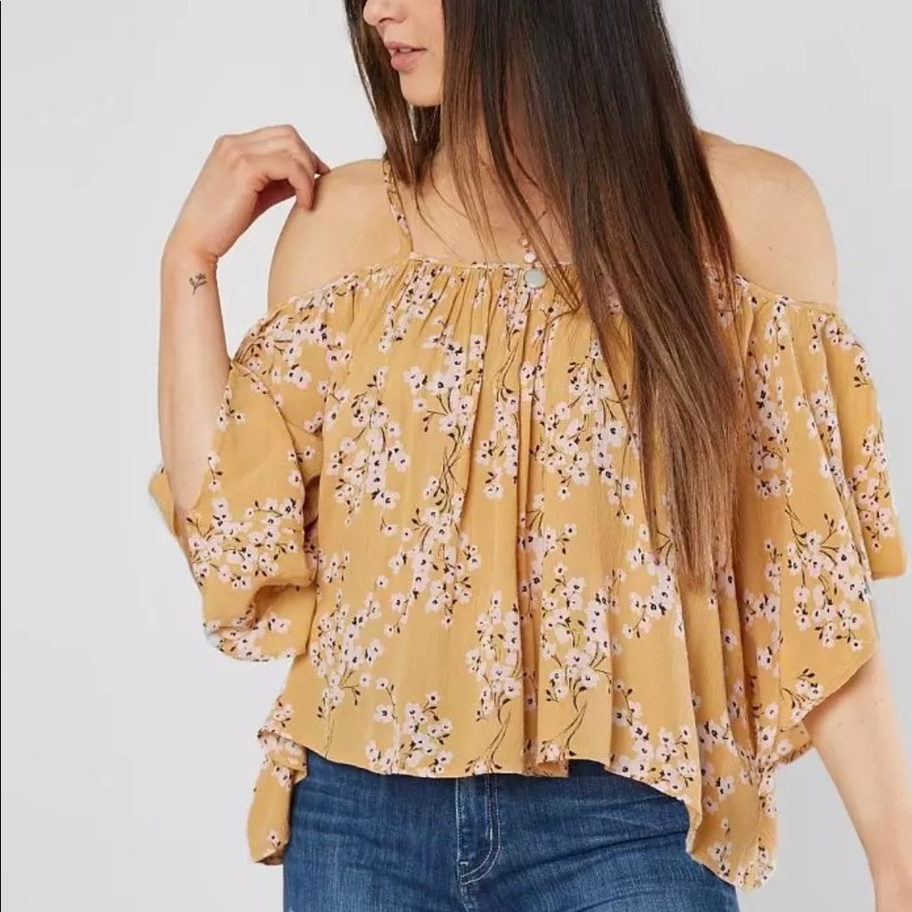 Billabong Women’s cold shoulder top; size small; color: yellow with pink flowers